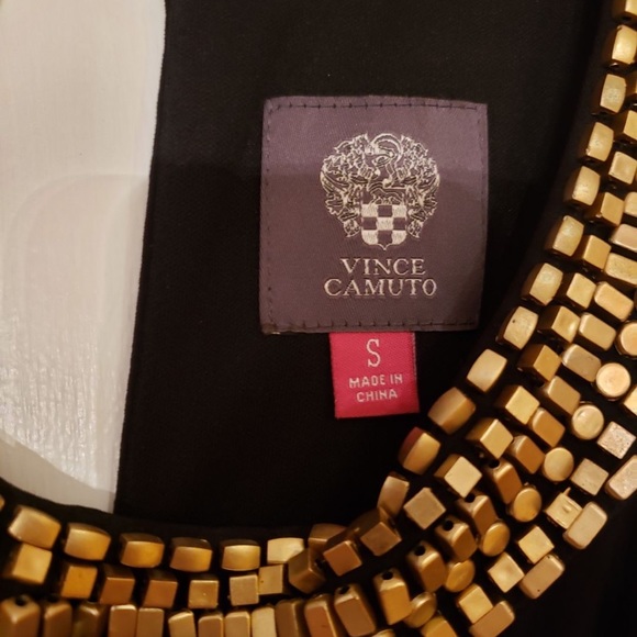 a full length black jumpsuit with a gold neckline - Picture 3 of 4